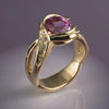 Ring with garnet crystal and zirconia